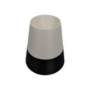 Leafprints 3D Sprout Self Watering Planter, 4-inch two-tone planter in black and white, shown unplanted.
